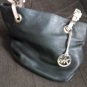 A Michael purse and a Vera Bradley purse